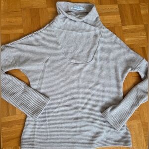 Women's Light Cream Ribbed Turtleneck Sweater